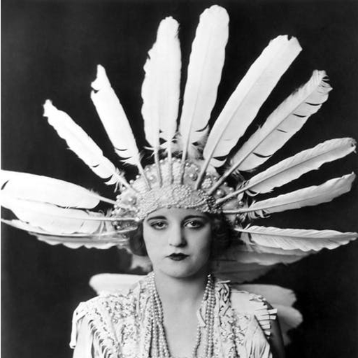 Tallulah Bankhead wearing a feather headdress
