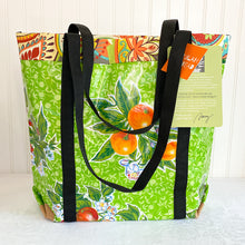 Load image into Gallery viewer, Market bag in green floral oilcloth
