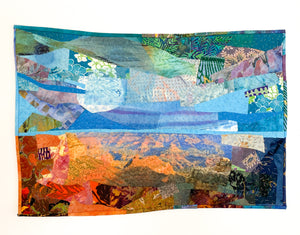 Under Threat I, framed stitched textile collage