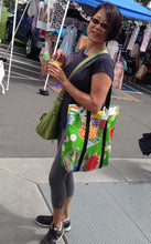 Load image into Gallery viewer, Customer showing of her green market bag from Tallulah ArtHead
